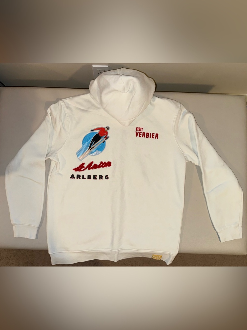 Zara White Hoodie with Ski Graphic and Red Script